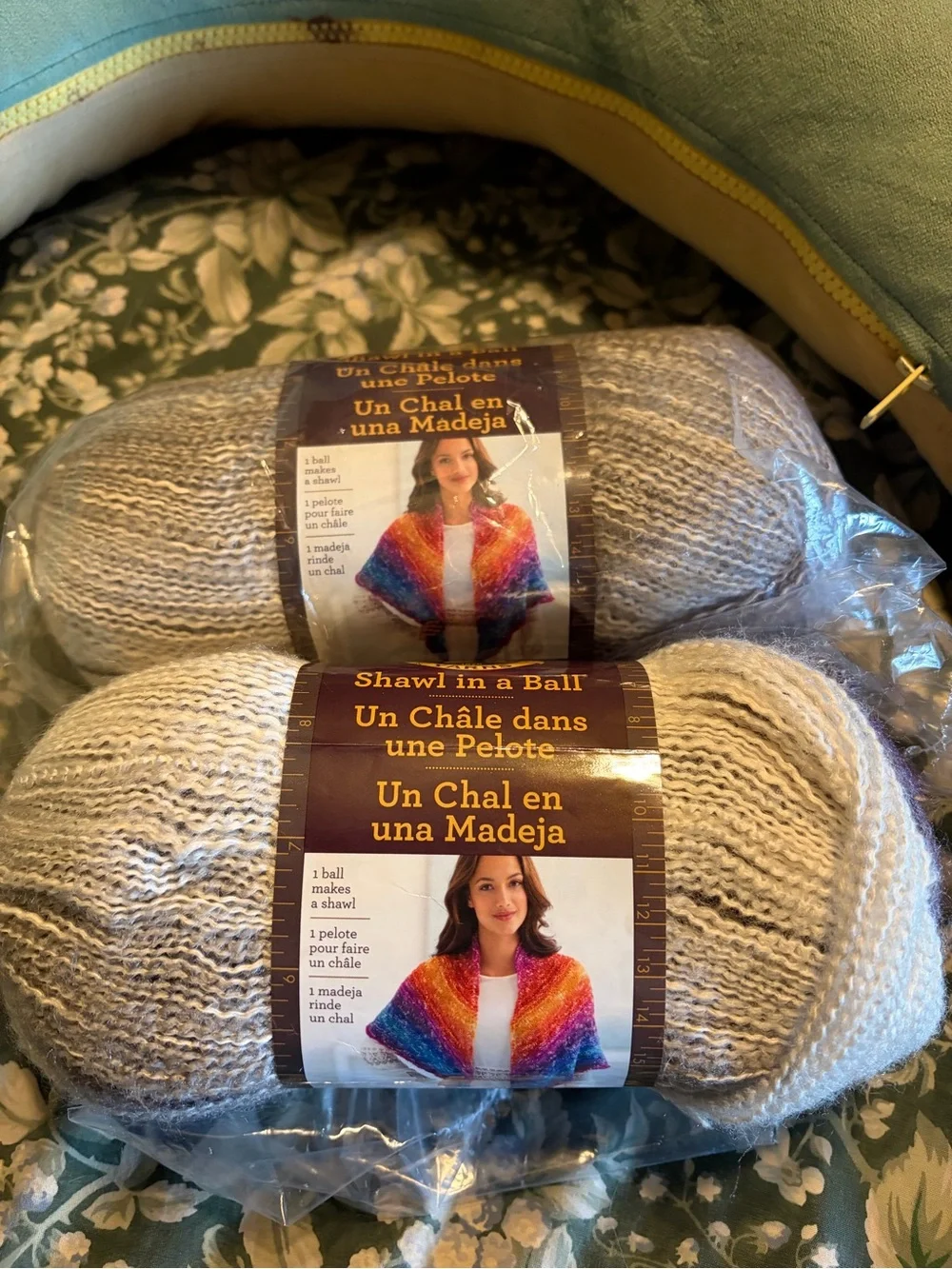 Lion brand shawl in a ball in mindful mauve, two balls new in plastic.